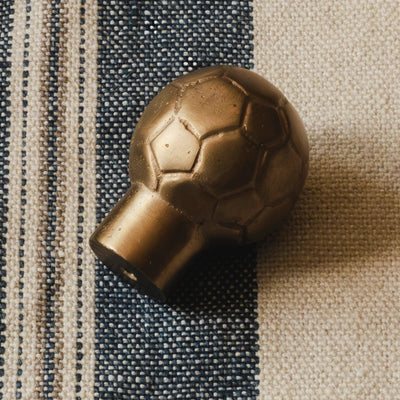 Photography by Joey Kendal Brown | Whimsical Football Cabinet Knob shown in burnished bronze (BR).