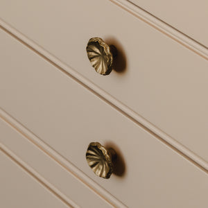Design by St Giles Furniture | Photography by Joey Kendal Brown | Whimsical Tutu Cabinet Knob shown in burnished bronze.