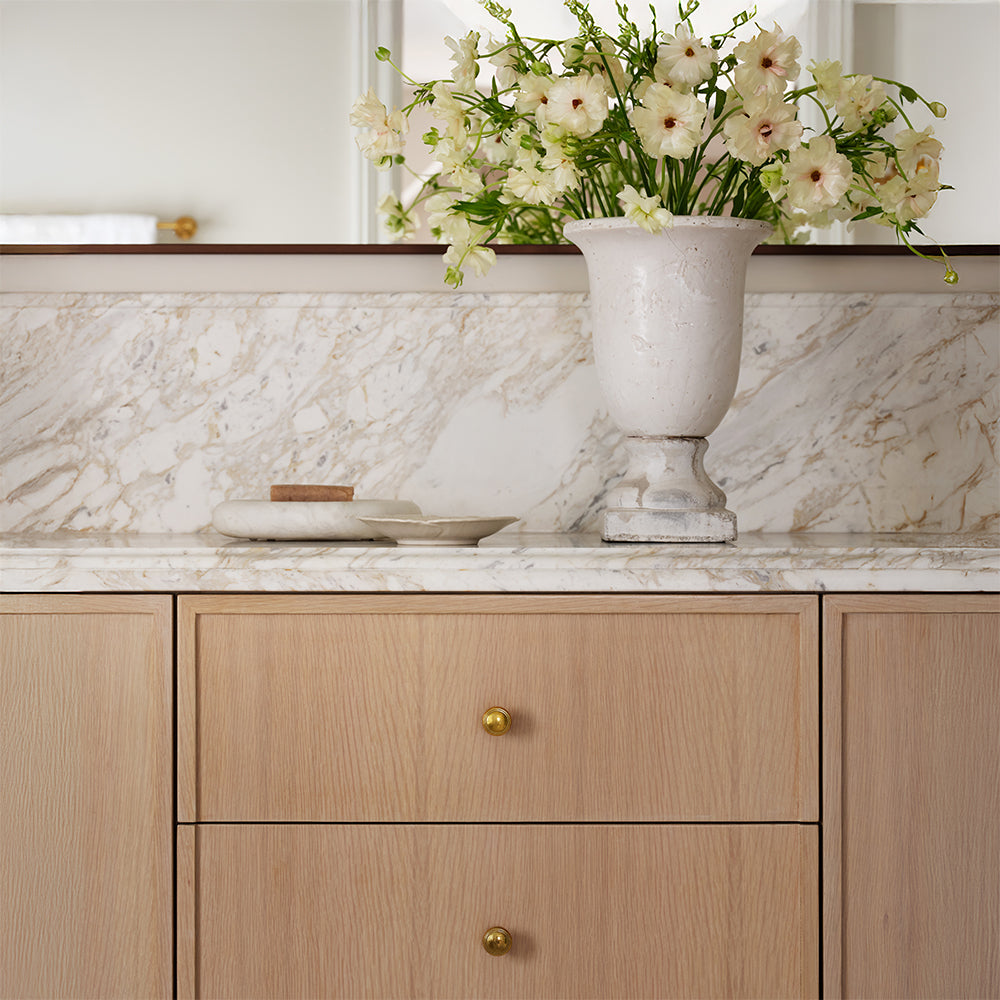 Design by Lindsey Goddard Interiors | Carlton Cabinet Knobs shown in our aged brass (BEL) finish.