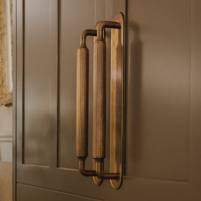 Project by Brett Calvert-Harrison | Photography by Joey Kendal Brown | Barwick Ridged Cabinet Pull Handles with Backplates shown in our aged brass (BEL) finish.